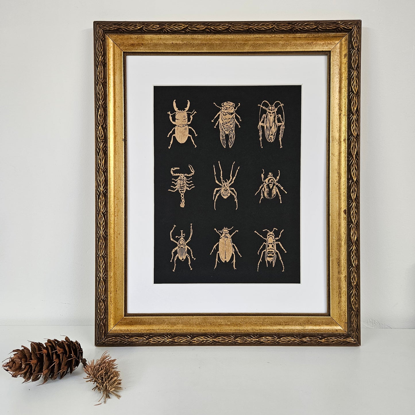 Specimen Drawer linocut gold on black