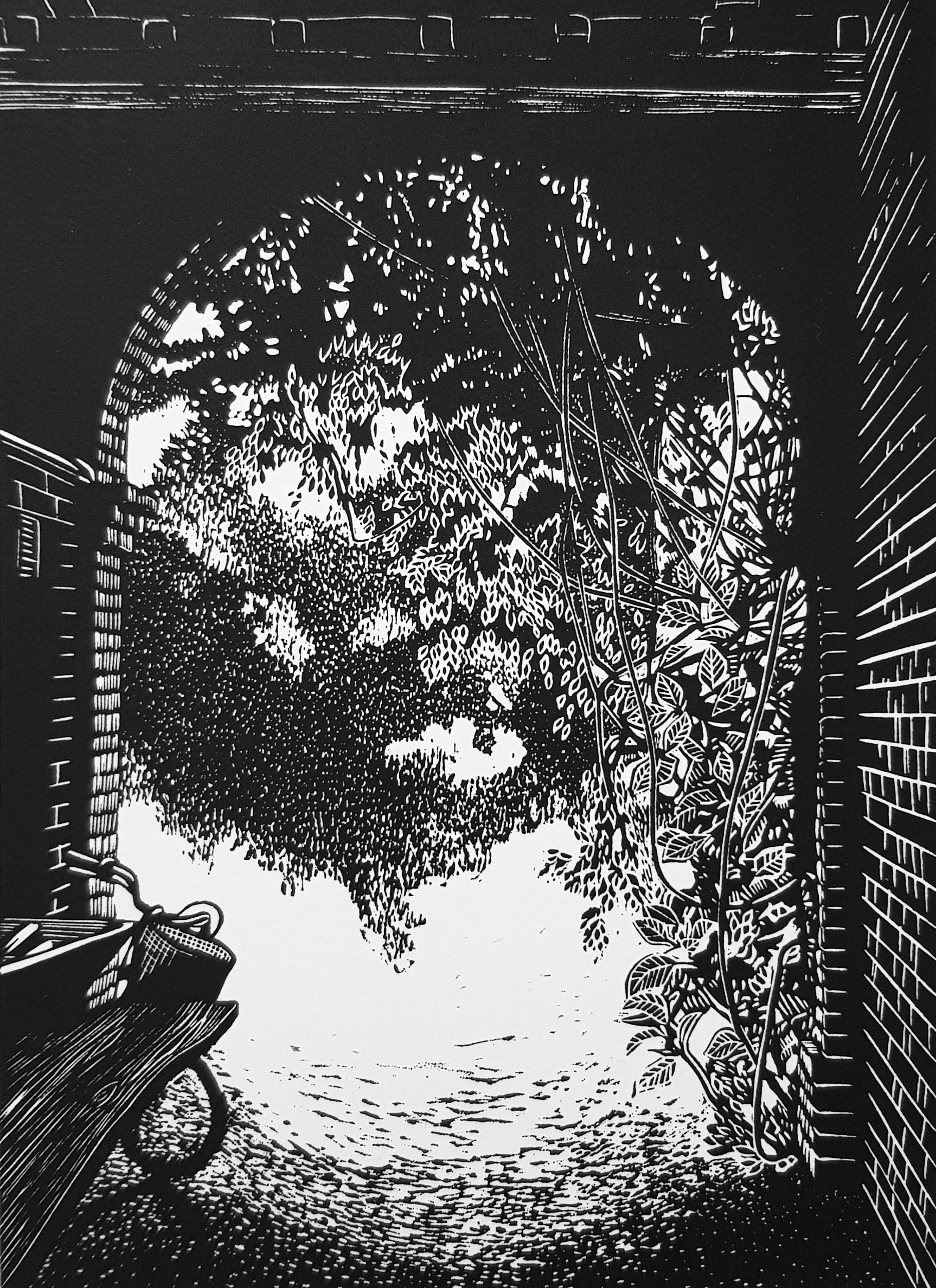 Black and white linocut of an archway wth bicycle