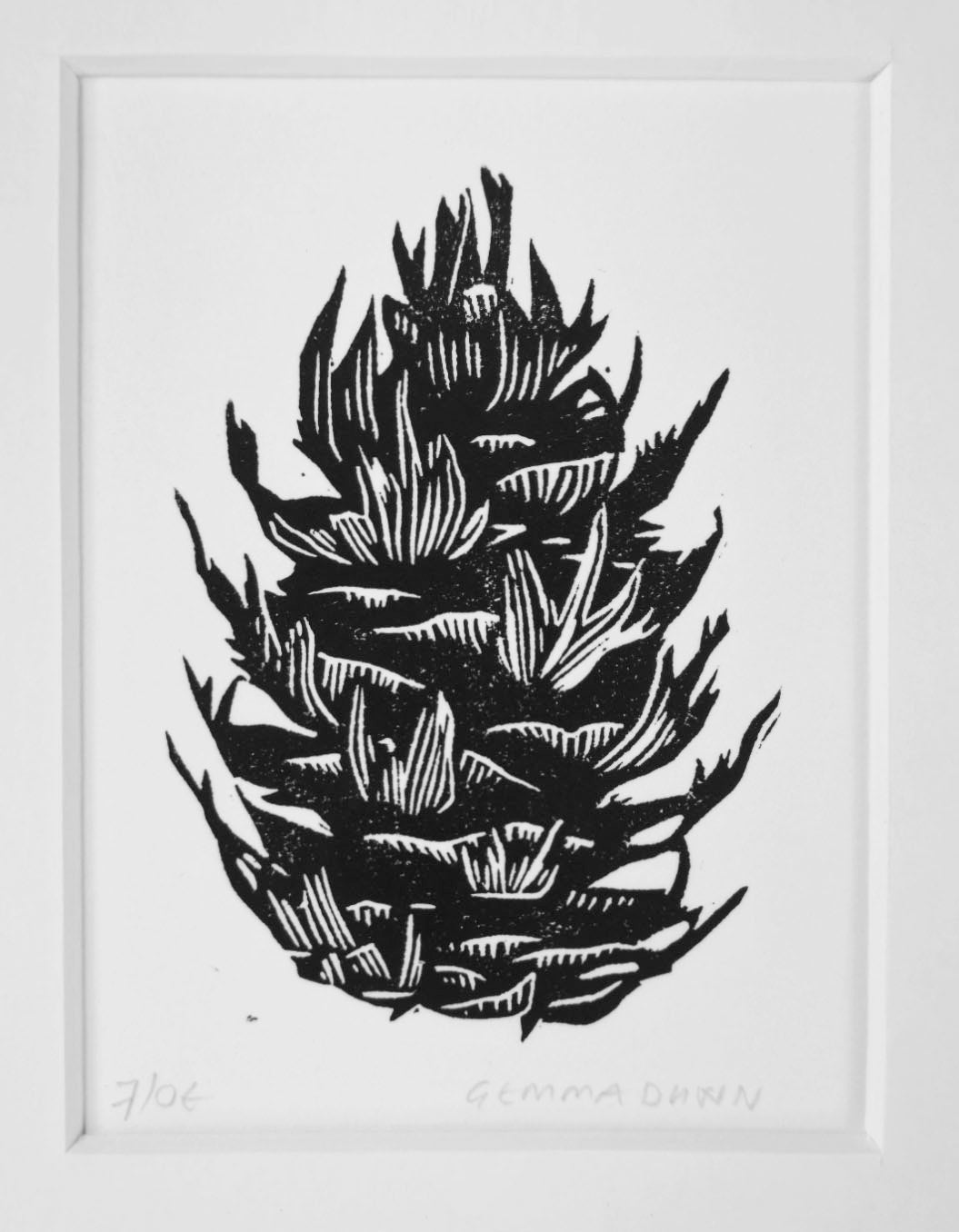 Black and white linocut of a douglas fir cone